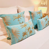 Blue Hawaii coastal boho blue cushion cover 50x50cm with gold palm tree embroidery on a turquoise background