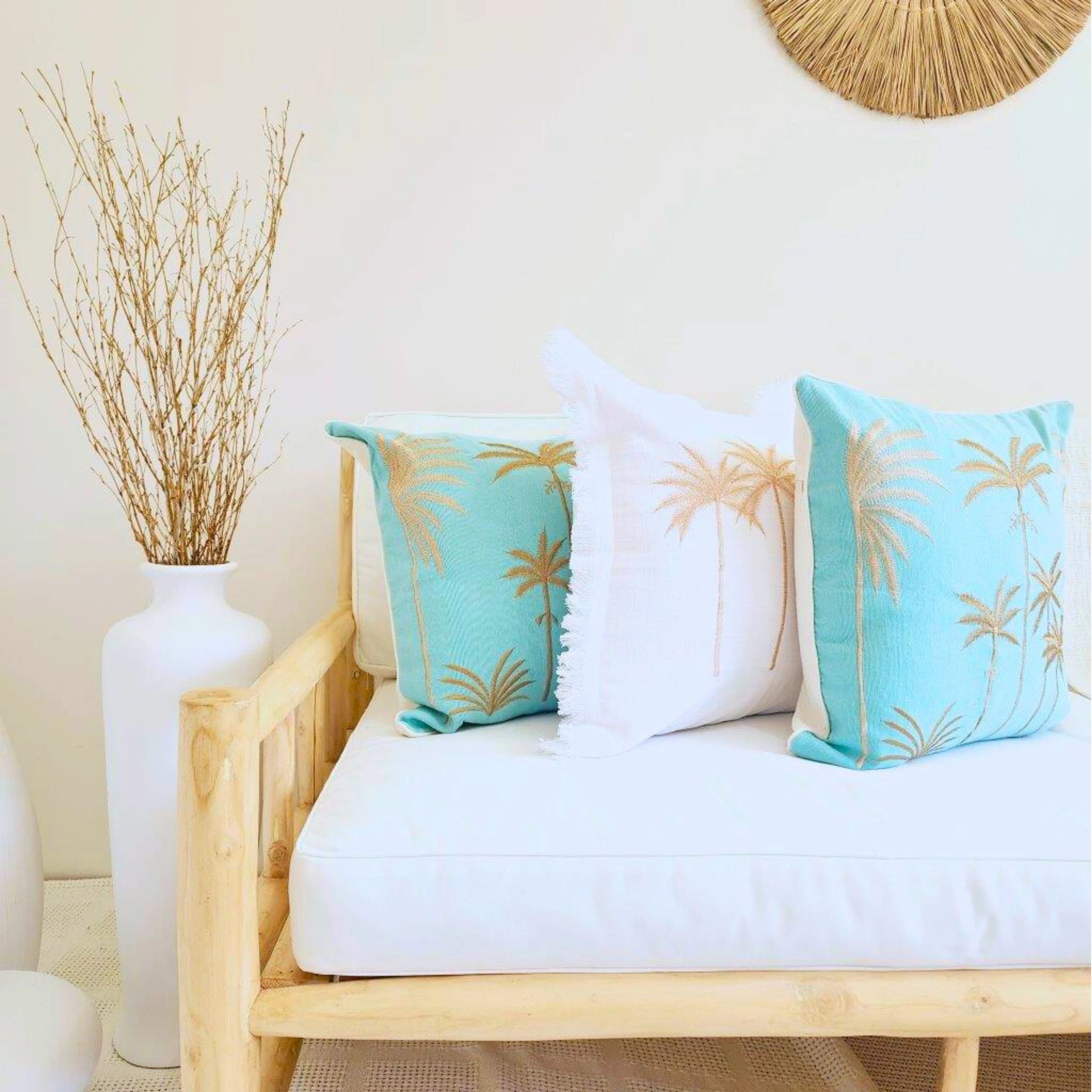 Blue Hawaii coastal boho blue cushion cover 50x50cm with gold palm tree embroidery on a turquoise background