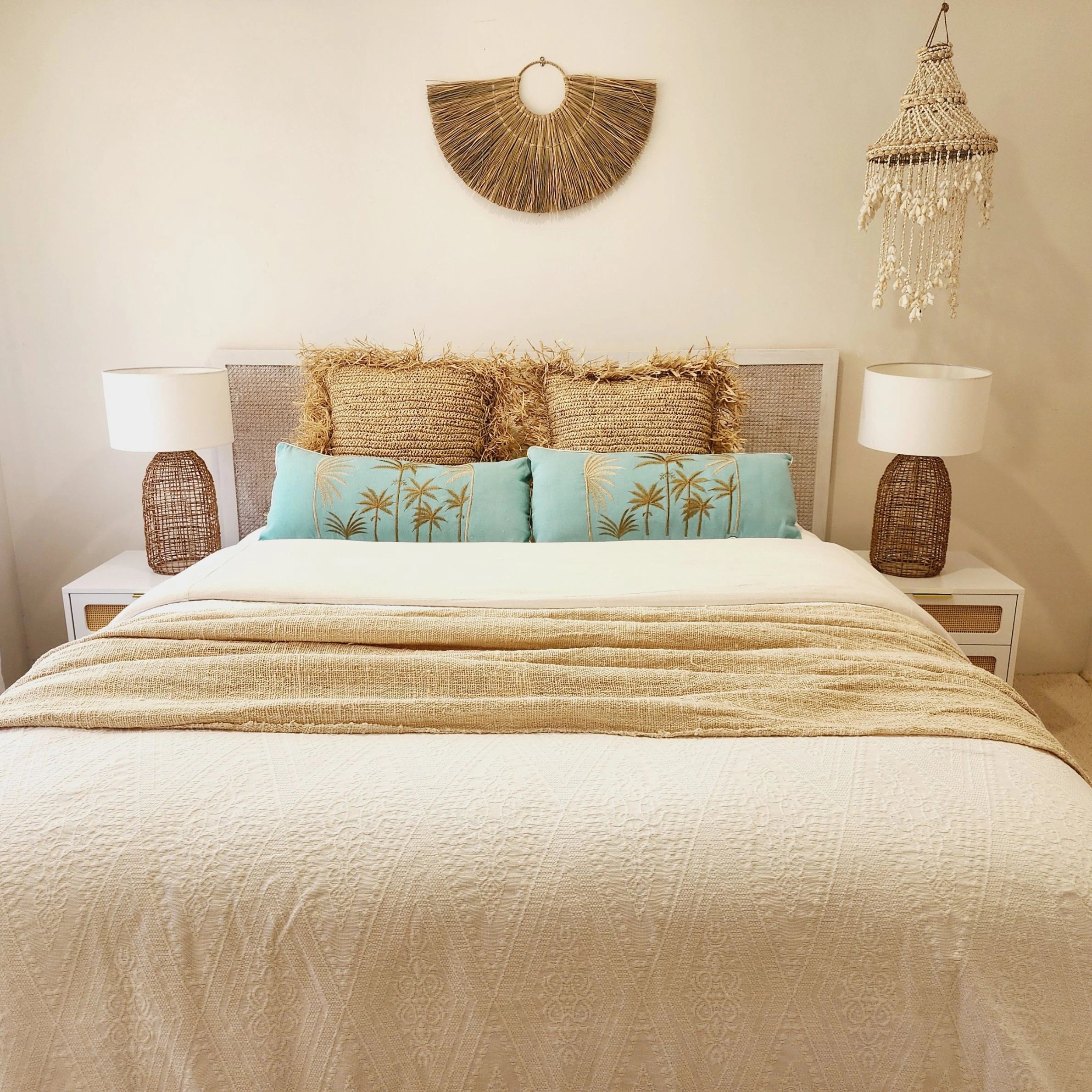 Blue Hawaii coastal boho blue cushion cover 50x50cm with gold palm tree embroidery on a turquoise background