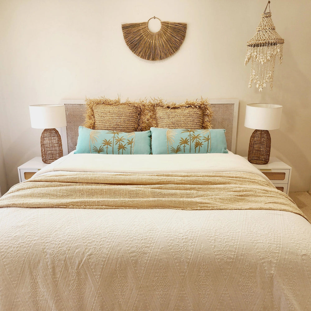 Blue Hawaii coastal boho blue cushion cover 50x50cm with gold palm tree embroidery on a turquoise background